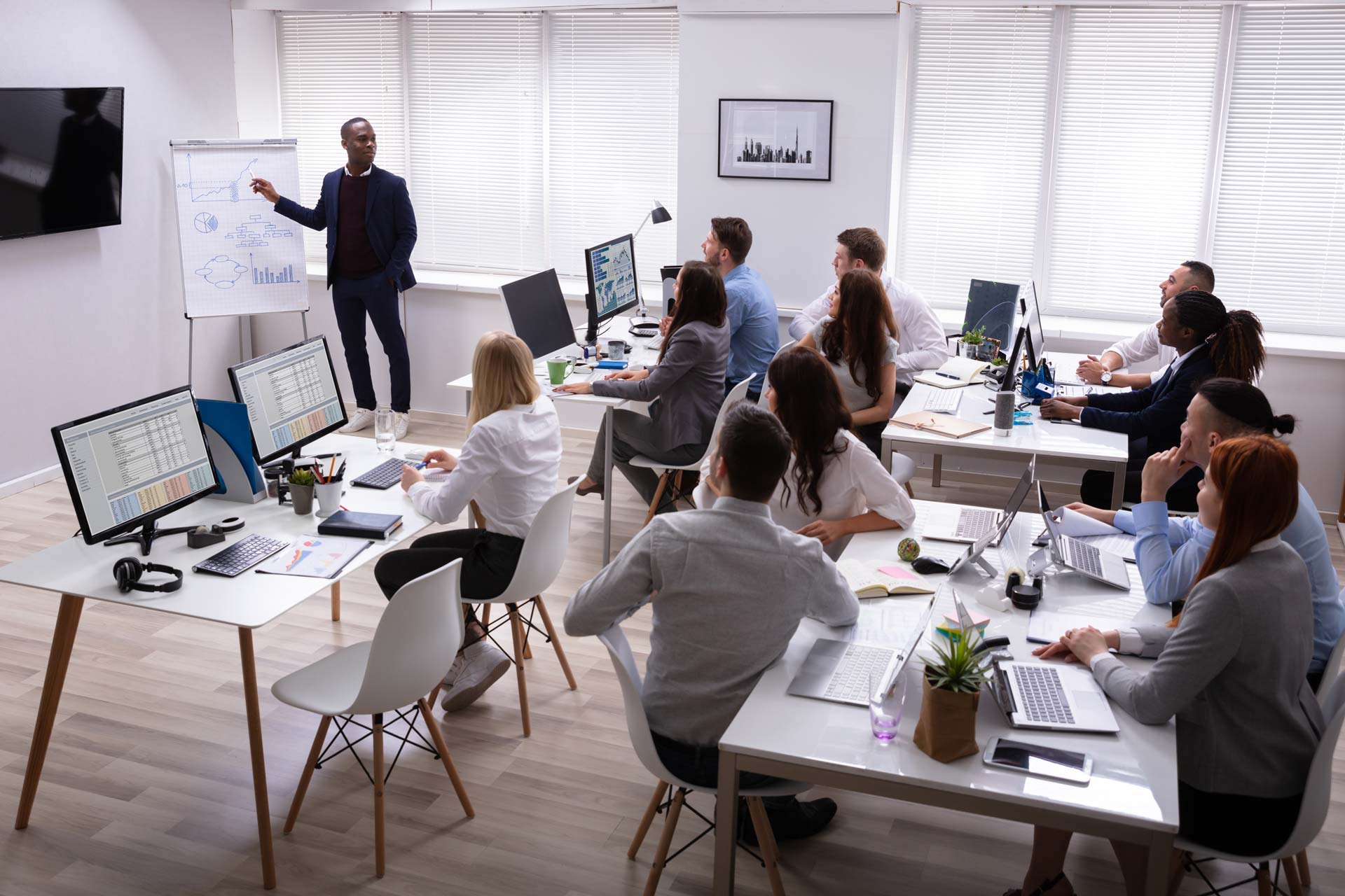 Company meeting: employees discussing the future of the company 